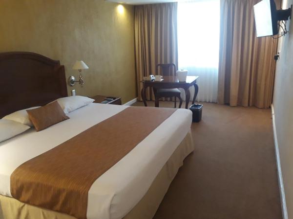 Country Plaza : photo 1 de la chambre chambre lit king-size