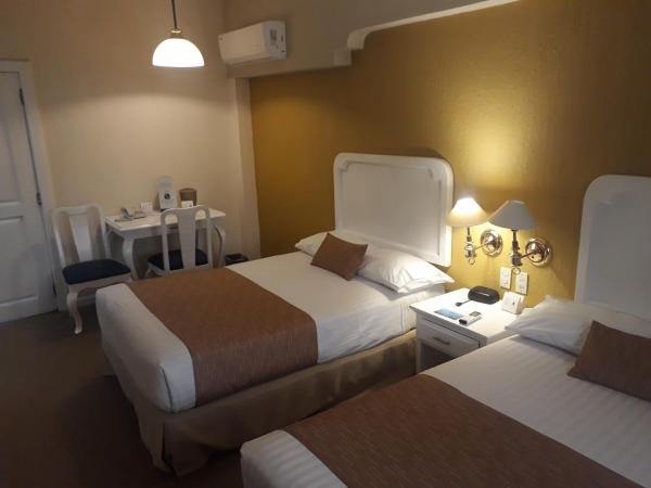 Country Plaza : photo 5 de la chambre chambre double avec 2 lits doubles