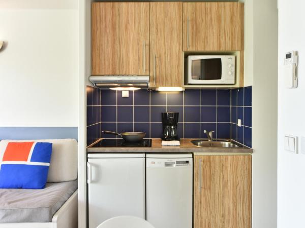 Résidence Pierre & Vacances Premium Port Prestige : photo 5 de la chambre  appartement 1 chambre avec climatisation et terrasse (4 personnes)