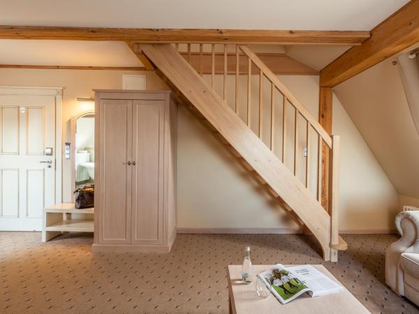 Zamek Topacz : photo 1 de la chambre chambre double ou lits jumeaux supérieure avec mezzanine - bâtiment spichlerz