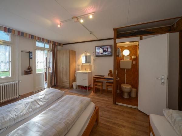 Swiss Lodge Hotel Bernerhof : photo 3 de la chambre chambre triple
