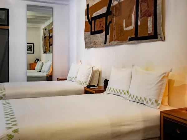 Hotel Los Amantes : photo 1 de la chambre chambre lits jumeaux