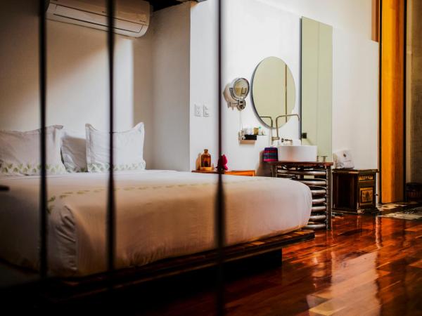 Hotel Los Amantes : photo 3 de la chambre suite lit king-size avec balcon