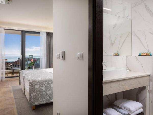 Ellure Luxury Suites : photo 5 de la chambre chambre adria lits jumeaux - vue sur mer