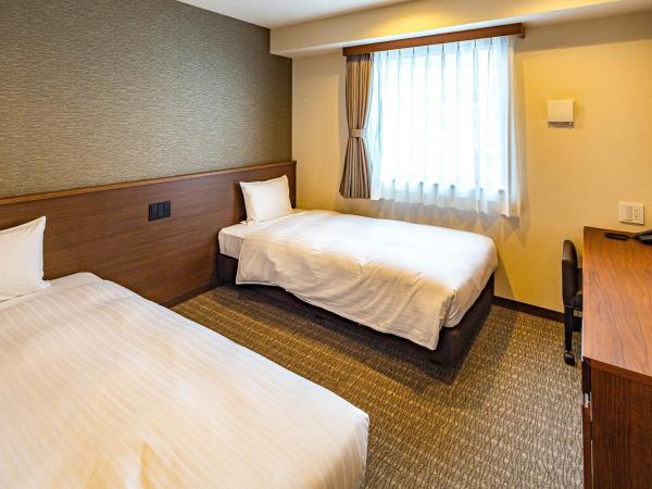 Bande Hotel Tenpozan Higashi : photo 3 de la chambre chambre lits jumeaux