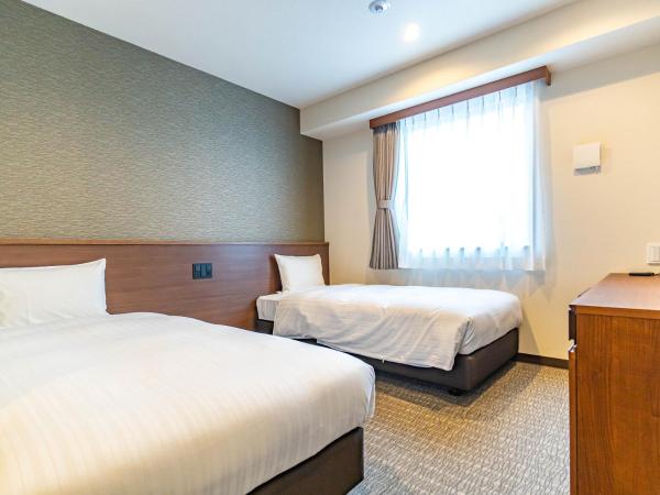 Bande Hotel Tenpozan Higashi : photo 4 de la chambre chambre lits jumeaux