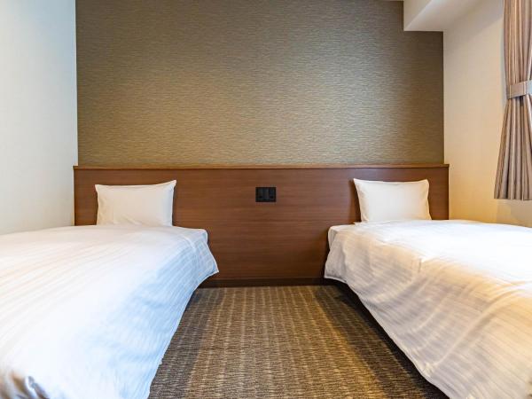 Bande Hotel Tenpozan Higashi : photo 2 de la chambre chambre lits jumeaux