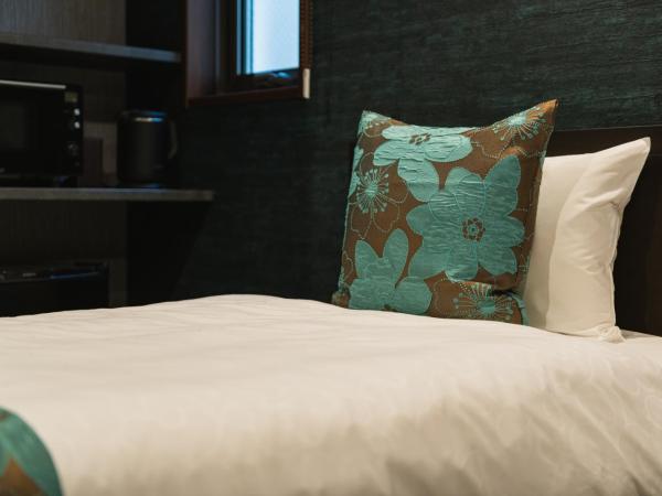 GRAND BASE Haruyoshi : photo 4 de la chambre chambre lits jumeaux standard