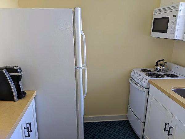 Grande Colonial La Jolla : photo 2 de la chambre chambre lit king-size avec kitchenette - vue sur jardin