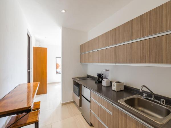 Stay Tropical : photo 7 de la chambre appartement avec terrasse