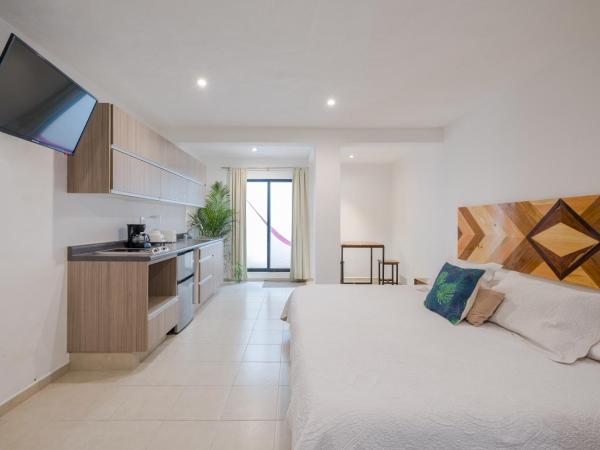 Stay Tropical : photo 9 de la chambre appartement - rez-de-chaussée