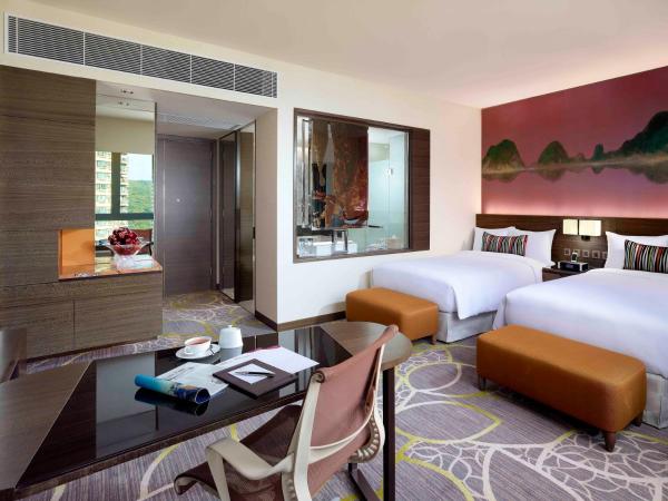 Crowne Plaza Hong Kong Kowloon East, an IHG Hotel : photo 8 de la chambre chambre lits jumeaux standard avec vue sur jardin