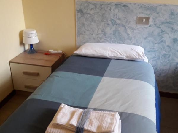 La Casa Nel Verde 2 : photo 7 de la chambre chambre double ou lits jumeaux avec salle de bains privative externe