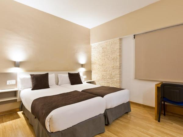 Hotel Travessera : photo 1 de la chambre chambre lits jumeaux