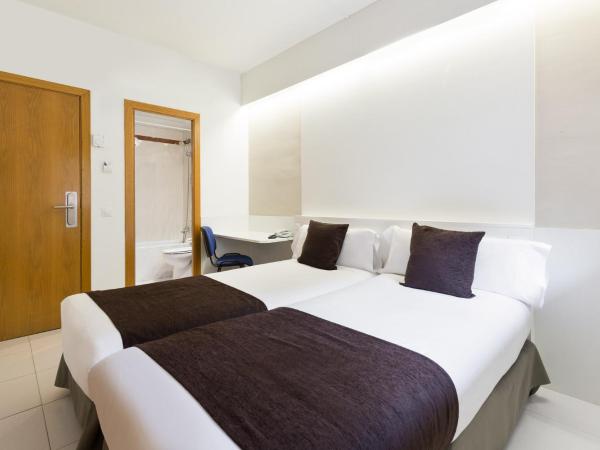 Hotel Travessera : photo 4 de la chambre chambre lits jumeaux