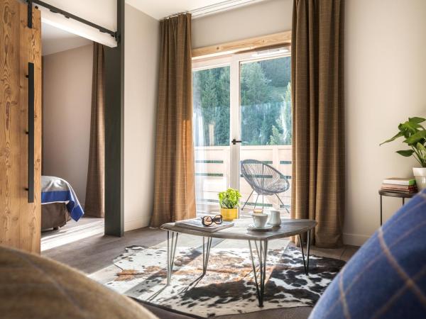 Ecrin Blanc Resort Courchevel - Aquapark : photo 3 de la chambre grande suite supérieure avec accès au parc aquatique