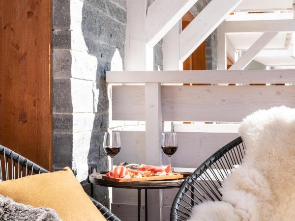 Ecrin Blanc Resort Courchevel - Aquapark : photo 4 de la chambre grande suite supérieure avec accès au parc aquatique