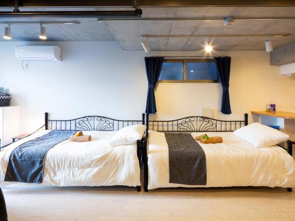 Laffitte Hirai Condominium Hotel : photo 8 de la chambre studio familial