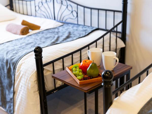 Laffitte Hirai Condominium Hotel : photo 7 de la chambre studio familial