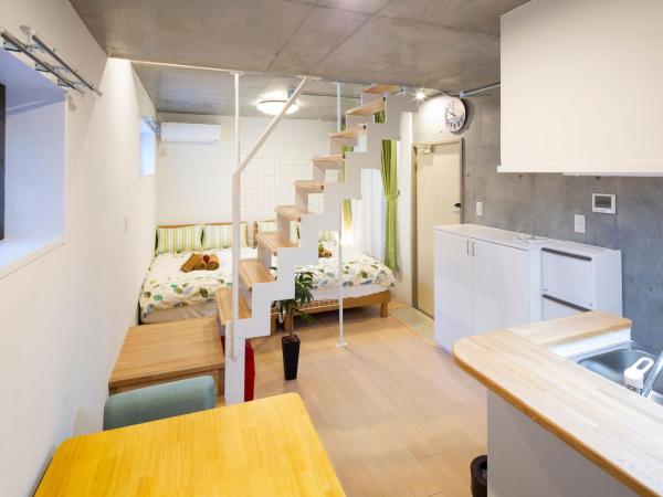 Laffitte Hirai Condominium Hotel : photo 3 de la chambre appartement en duplex