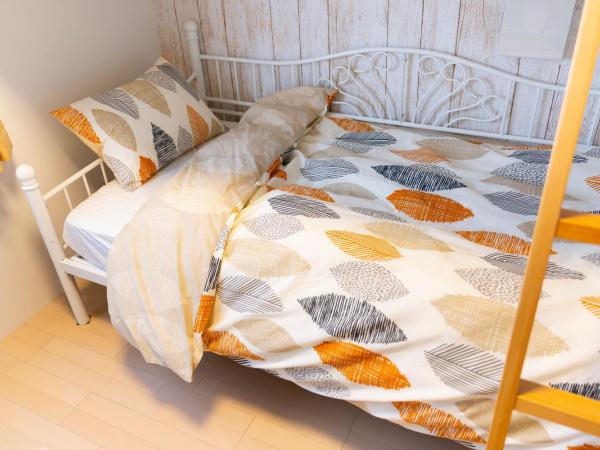 Laffitte Hirai Condominium Hotel : photo 2 de la chambre chambre triple