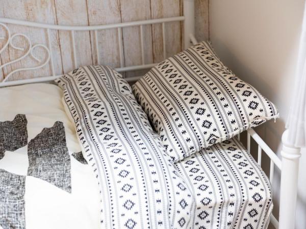 Laffitte Hirai Condominium Hotel : photo 9 de la chambre chambre triple