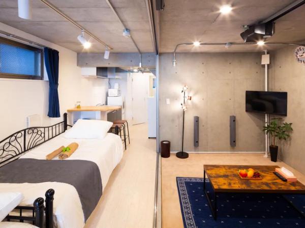 Laffitte Hirai Condominium Hotel : photo 4 de la chambre studio familial