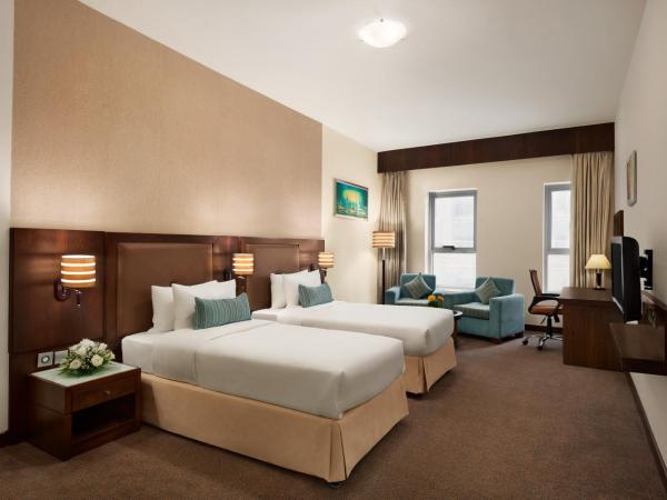 Ramada by Wyndham Dubai Deira : photo 1 de la chambre chambre lits jumeaux - accessible aux personnes à mobilité réduite - non-fumeurs - 20 % de réduction sur la nourriture et les boissons