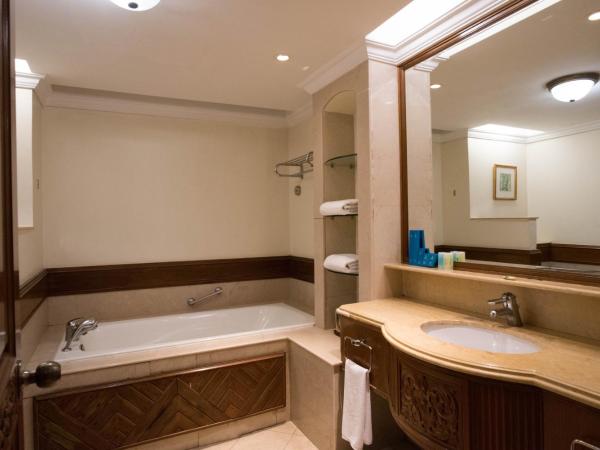 Nexus Resort & Spa Karambunai : photo 3 de la chambre chambre double ou lits jumeaux de luxe jardin bornéo