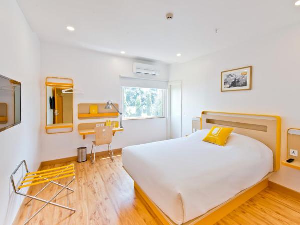 bloomrooms @ City Centre : photo 2 de la chambre chambre double standard