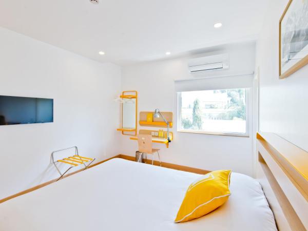 bloomrooms @ City Centre : photo 5 de la chambre chambre double standard