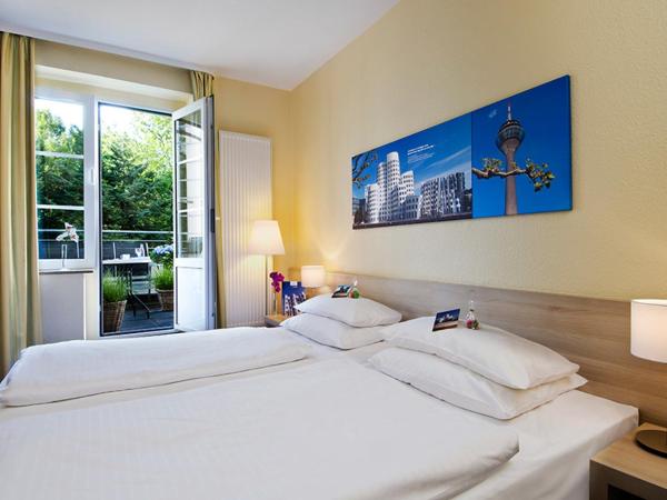 Hotel am Hofgarten : photo 2 de la chambre chambre double deluxe avec balcon