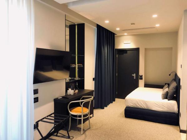 Best Western Hotel Plaza : photo 3 de la chambre suite junior avec lit king-size et lit queen-size - terrasse