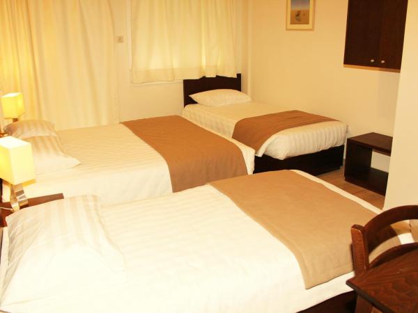 Rea Hotel : photo 1 de la chambre chambre quadruple Économique