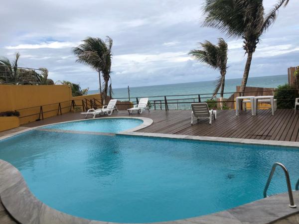 Atlântico Flat ap 204 em Ponta Negra : photo 5 de la chambre chambre double ou lits jumeaux - vue partielle sur mer