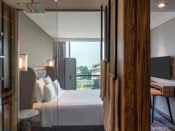 Swissôtel Jakarta PIK Avenue : photo 4 de la chambre chambre lit king-size avantage suisse 