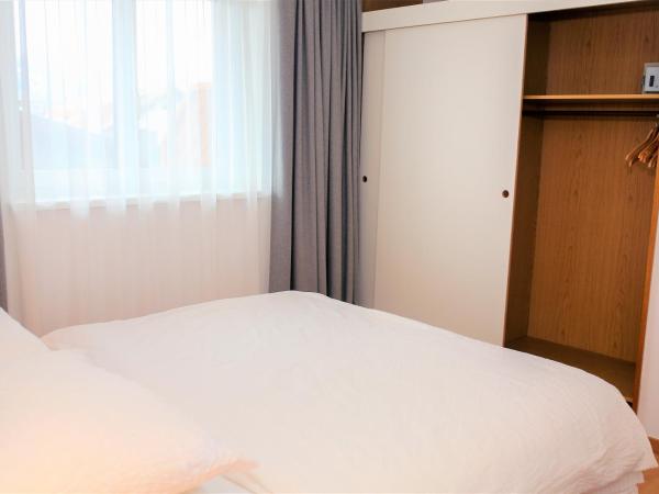 Hotel Sonnenhof - bed & breakfast & appartements : photo 10 de la chambre chambre familiale avec balcon