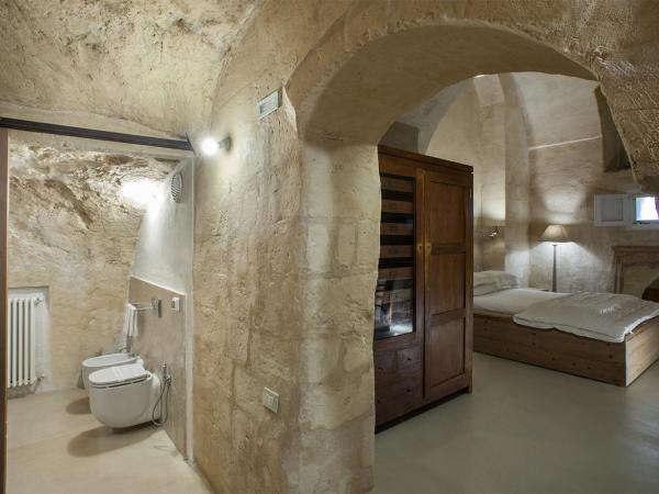 L'Hotel In Pietra : photo 4 de la chambre suite avec bain à remous et sauna privée