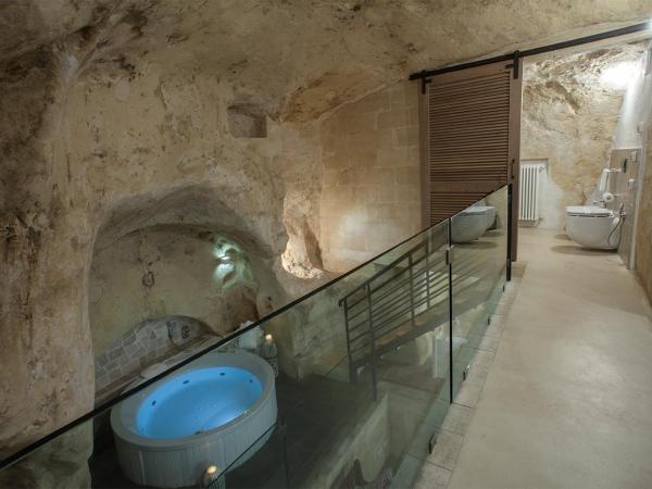 L'Hotel In Pietra : photo 2 de la chambre suite avec bain à remous et sauna privée