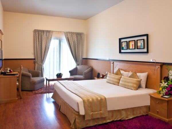 Landmark Plaza Hotel : photo 2 de la chambre chambre lit king-size supérieure