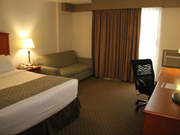 Ramada by Wyndham Edmonton South : photo 3 de la chambre chambre lit queen-size deluxe