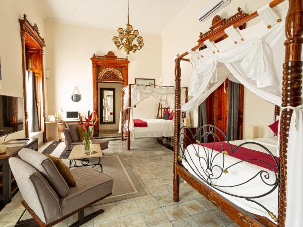 Viva Merida Hotel Boutique : photo 1 de la chambre suite familiale deluxe