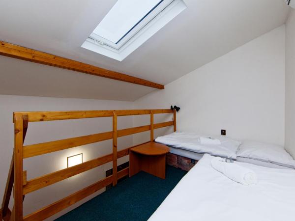 Hotel Wolf : photo 2 de la chambre chambre quadruple avec balcon