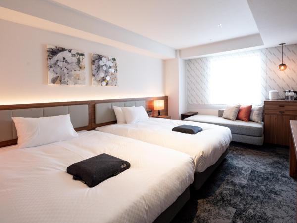 HOTEL FORZA HAKATAEKI CHIKUSHIGUCHI Ⅱ : photo 7 de la chambre deluxe twin room with two double beds(2 adult) - non-smoking