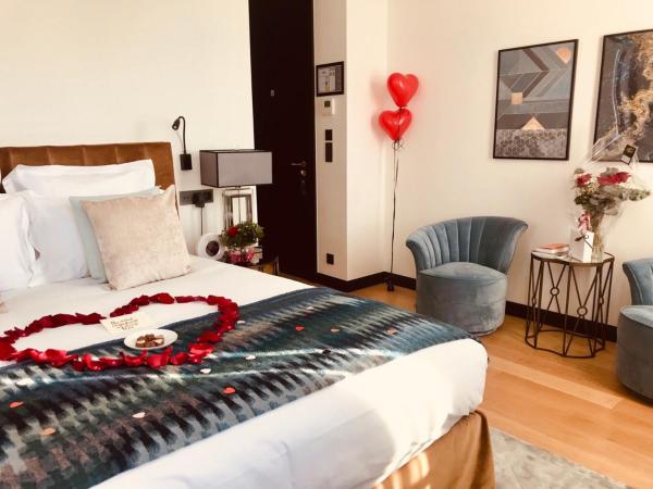 Hôtel Restaurant le Touring - Teritoria : photo 1 de la chambre chambre deluxe - vue sur mer