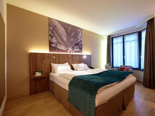 Holiday Inn Brussels Schuman, an IHG Hotel : photo 3 de la chambre chambre lit king-size pour personnes à mobilité réduite