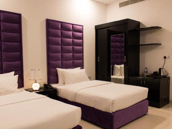 Parkside Plaza Muscat : photo 3 de la chambre chambre lits jumeaux standard