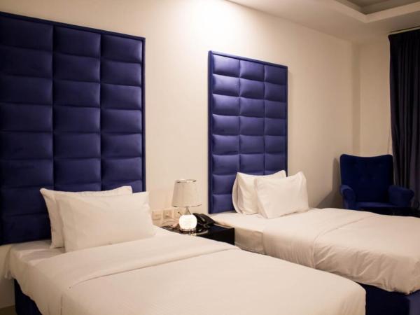 Parkside Plaza Muscat : photo 8 de la chambre chambre lits jumeaux standard