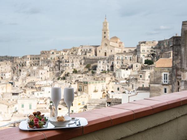 L' Infinito dei Sassi : photo 6 de la chambre chambre double ou lits jumeaux deluxe - vue sur ville