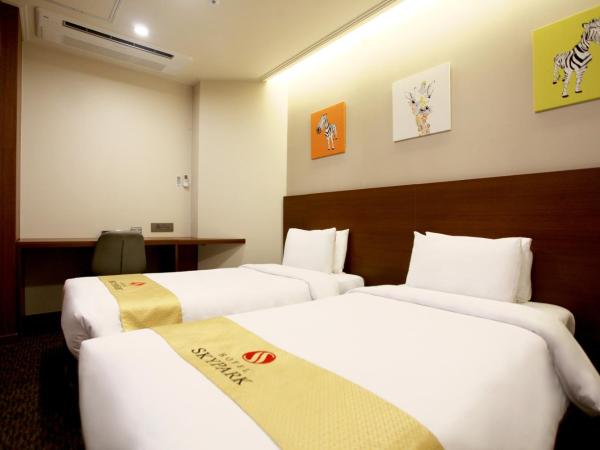 Hotel Skypark Myeongdong 2 : photo 1 de la chambre chambre familiale